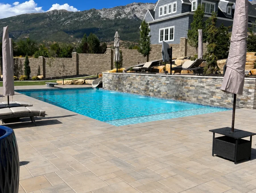 Pebble interior finish and cantilever coping detail on a finished pool